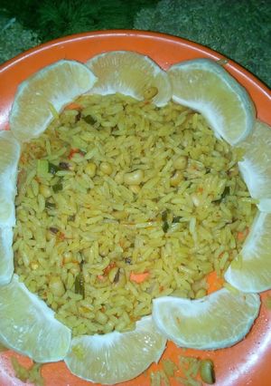 A picture of Coconut jollof rice With lemon.