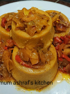 A picture of Moi moi wt cabbage sauce.