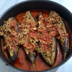 A picture of Karnıyarık (Eggplants Stuffed with Ground Meat Sauce).