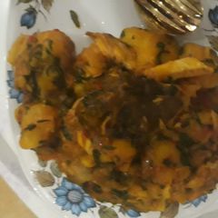 A picture of Sweet potatoes porriage with smoked fish and scent leaves.