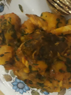 A picture of Sweet potatoes porriage with smoked fish and scent leaves.