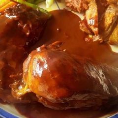 A picture of Tangy Tomato chicken.