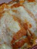Canelones de espinaca con huevos duros y salsa rosada