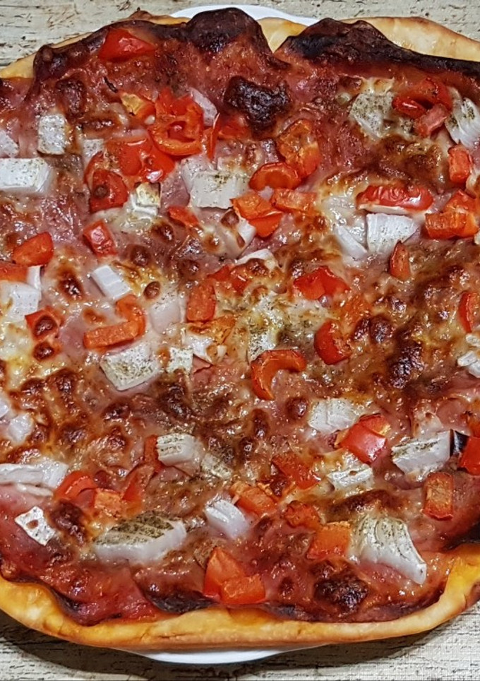 Una foto de Pizza casera de chopped de lata 👌