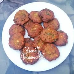 A picture of Dal Vadas with Spring Onions.