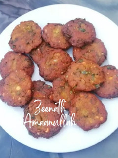 A picture of Dal Vadas with Spring Onions.