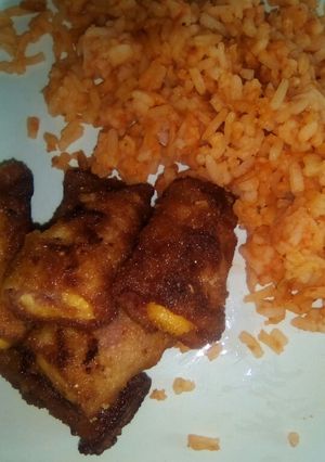 Una foto de Rollitos de jamón con queso amarillo empanizados