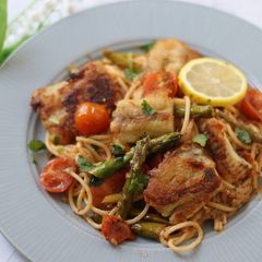 A picture of Grilled Pollock with lemon and black pepper pasta sauce.
