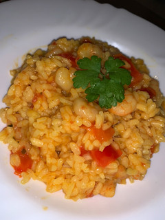 Una foto de Arroz meloso con gambas