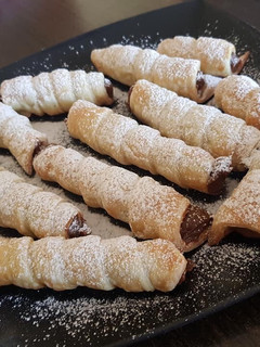 Una foto de Cañoncitos rellenos con Dulce de leche