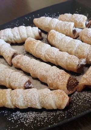 Una foto de Cañoncitos rellenos con Dulce de leche