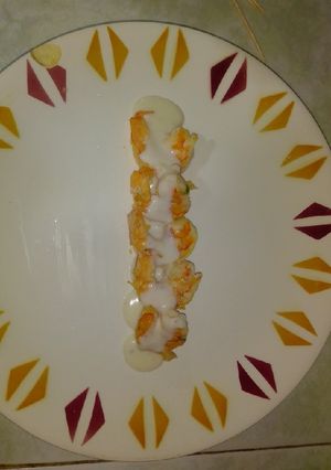 Una foto de Camarones con salsa bechamel cremosos