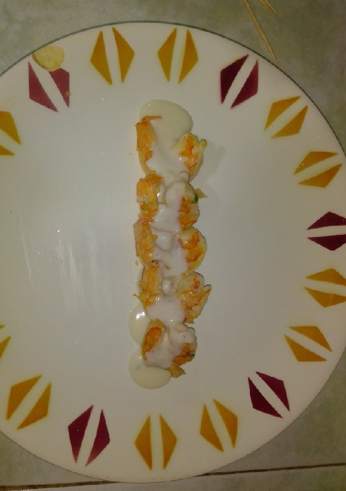 Una foto de Camarones con salsa bechamel cremosos