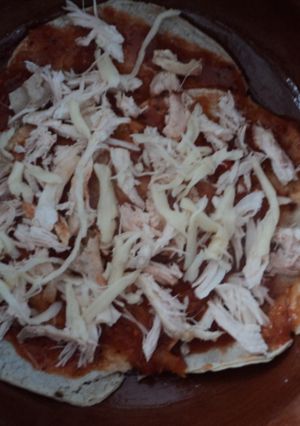 Una foto de Tortillas enchilasdas con quesillo