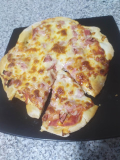 Una foto de Pizza
