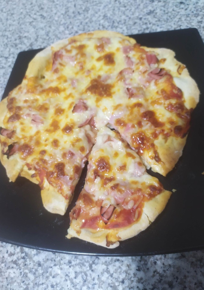 Una foto de Pizza