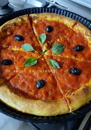 Une photo de Pizza basilic 🍕🍃