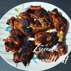 A picture of Charcoal Grilled Tandoori Chicken.