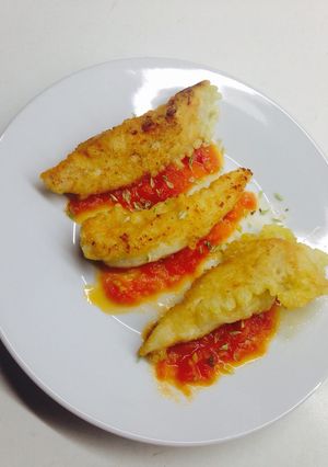 Una foto de Solomillos de pollo en salsa de tomate