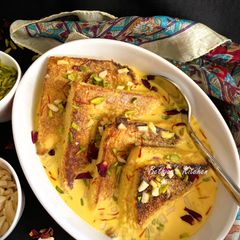 A picture of Shahi Tukda (stuffed with Red Dragon Fruit Kalakand) A Hyderabadi Fusion Dessert.
