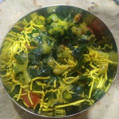 A picture of Green onion and sev sabji.