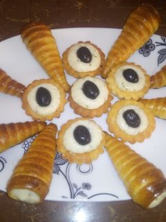 صورة لوصفة لي كورني بصلصة الجبن