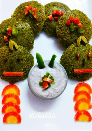 A picture of Daliya Spinach Idli.