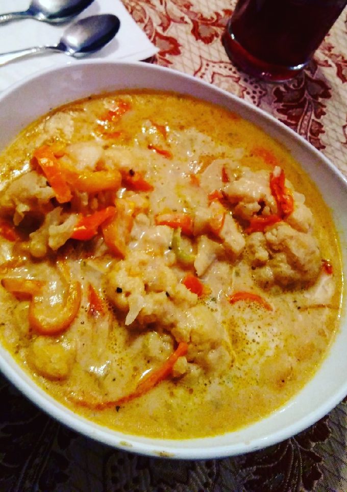 Una foto de Coliflor en salsa blanca con pimiento