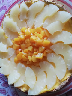 Una foto de Tartaleta piña durazno