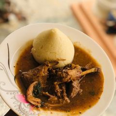 A picture of Tuwon semo with ogbono soup.