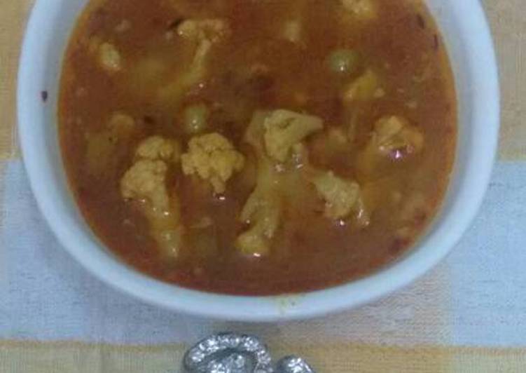 Steps to Make Quick Cauliflower &amp; peas (gravy)