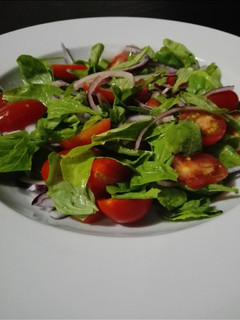 Una foto de Ensalada con rúcula