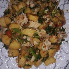 A picture of Potato with veggies.