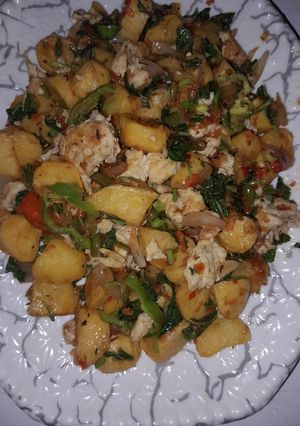 A picture of Potato with veggies.