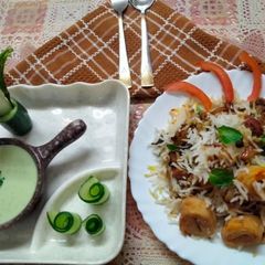 Awadhi biryani layered with soya chaap A picture of Awadhi biryani layered with soya chaap.