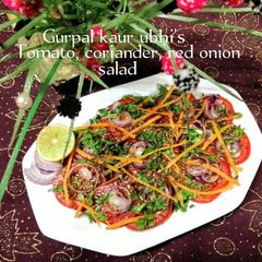 Tomato, coriander, red onion salad 🥗 A picture of Tomato, coriander, red onion salad 🥗.