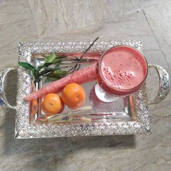 A picture of Orange carrot freshjuice.