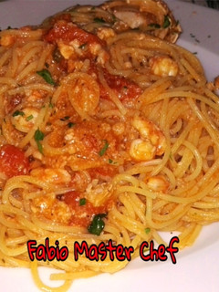 Foto di Spaghetti con Granchio, Pomodorini Freschi e Zafferano