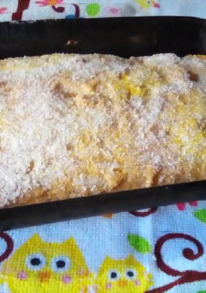 Una foto de Budín azucarado con polenta🌽🌟👪