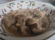 Una foto de lomo en salsa olla expres