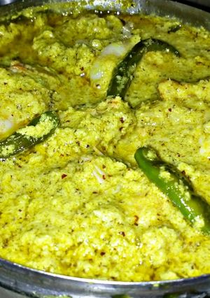 A picture of Prawn steamed in coconut and mustard sauce.