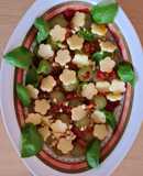 Ensalada de garbanzos, uvas, queso, albahaca, etc. Versión libre