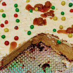 A picture of Buttercream icing with Smarties.