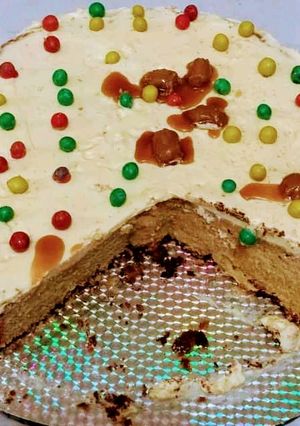 A picture of Buttercream icing with Smarties.