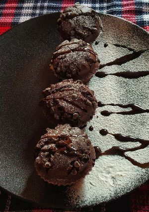 A picture of Eggless Chocolate Chip Muffins.