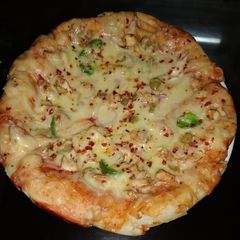 A picture of Extra cheesy thick crust pizza.
