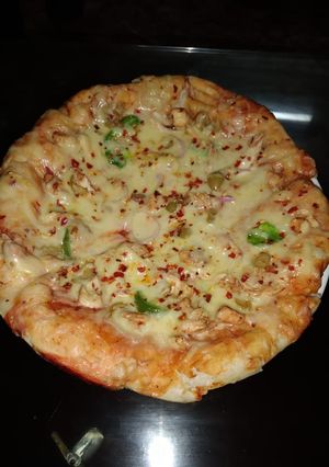 A picture of Extra cheesy thick crust pizza.