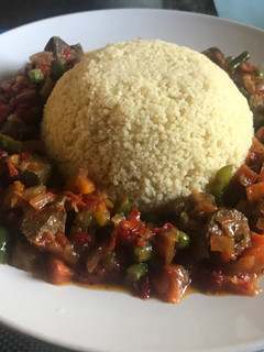 A picture of Cous cous with liver sauce.