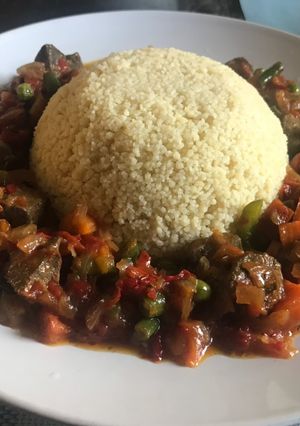 A picture of Cous cous with liver sauce.