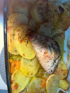 Una foto de Solomillo de cerdo al horno con patatas